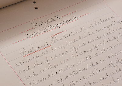 Article V of Idaho’s Constitution describes the Judicial Branch. This image shows the original copy of that document, maintained by the Idaho State Historical Society.